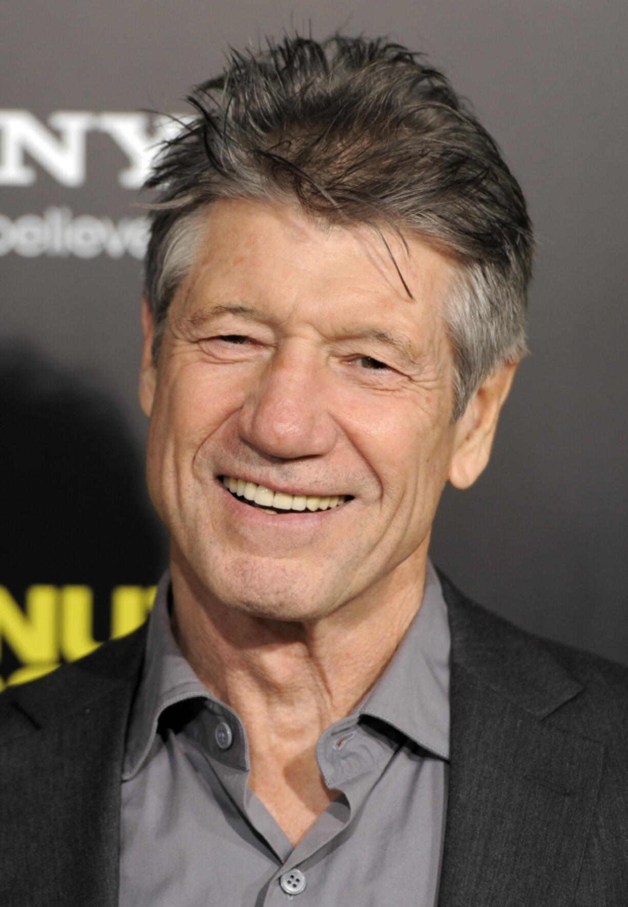 FILE - Fred Ward, a cast member in "30 Minutes or Less," poses at the premiere of the film in Los Angeles on Aug. 8, 2011. Ward, a veteran actor who brought a gruff tenderness to tough-guy roles in such films as ,??The Right Stuff,,?? ,??The Player,?? and ,??Tremors,,?? died Sunday, May 8, his publicist Ron Hofmann said Friday, May 13, 2022. He was 79.