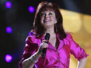 Naomi Judd performs at the CMA Music Festival in Nashville, Tenn., in 2009. Judd, the Kentucky-born matriarch of the Grammy-winning duo The Judds, has died. She was 76.