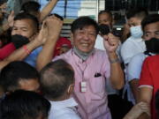 FILE - Presidential candidate Ferdinand "Bongbong" Marcos Jr. celebrates as he greets the crowd outside his headquarters in Mandaluyong, Philippines on Wednesday, May 11, 2022. Allies of the Philippines' presumptive next president, Marcos Jr., appear set to strongly dominate both chambers of Congress, further alarming activists after the late dictator's son scored an apparent election victory that will restore his family to the seat of power.