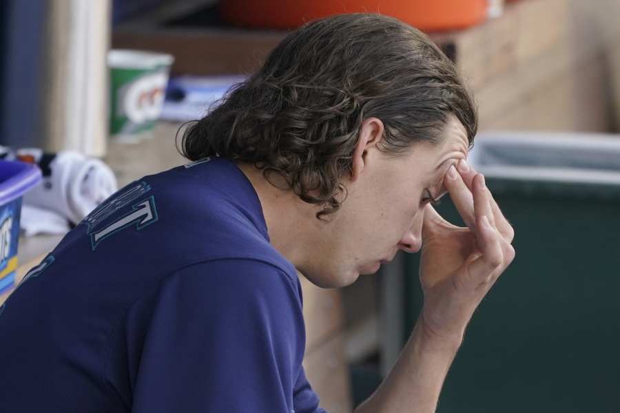 Seattle Mariners starting pitcher Logan Gilbert sits in the dugout after the top of the fourth inning of a baseball game after he gave up a grand slam to Philadelphia Phillies' Rhys Hoskins, Wednesday, May 11, 2022, in Seattle. (AP Photo/Ted S.