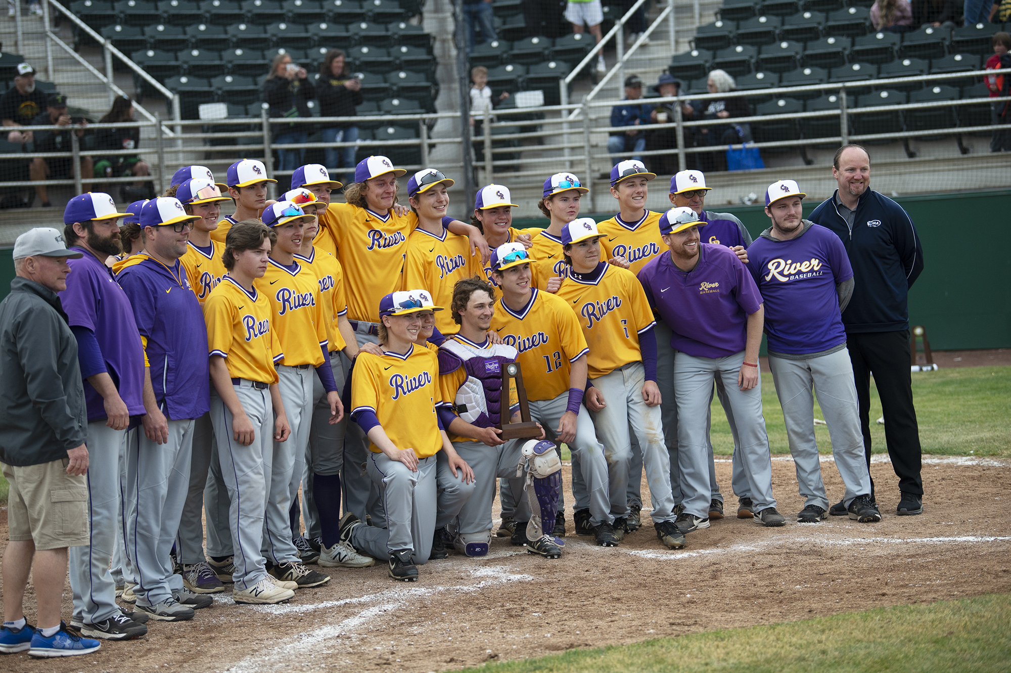 The Columbia River baseball team poses with the second place trophy after the Rapids' 1-0 loss to Tumwater in the Class 2A state championship baseball team in Yakima on Saturday, May 28, 2022.