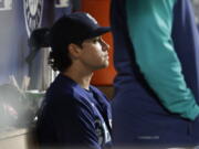 Seattle Mariners starting pitcher Marco Gonzales sits in the dugout after coming out of the baseball game during the sixth inning against the Tampa Bay Rays, Saturday, May 7, 2022, in Seattle.