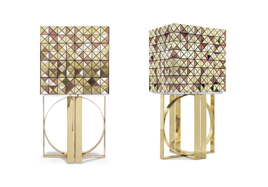 This combination of images released by Boca do Lobo shows the Pixel bar cabinet, clad in over a thousand multicolored triangles made of woods like palisander and African walnut, evoking a pixelated image. Inside, mirror and diamond-quilted blue silk showcases nine drawers, each with a golden knob.