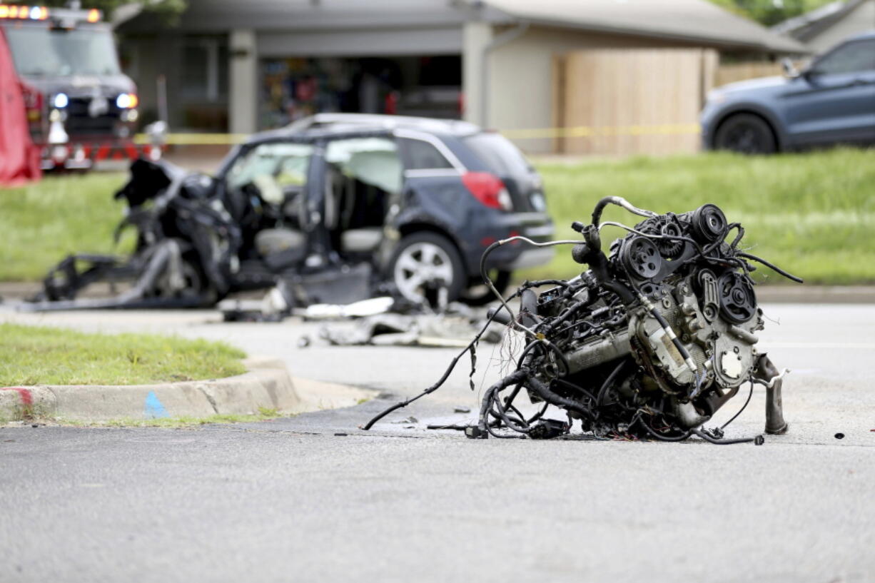 FILE - The scene of a fatality car crash, June 2, 2021, in Tulsa, Okla.  Nearly 43,000 people were killed on U.S. roads last year, the highest number in 16 years as Americans returned to the highways after the pandemic forced many to stay at home.  The 10.5% jump over 2020 numbers was the largest percentage increase since the National Highway Traffic Safety Administration began its fatality data collection system in 1975.