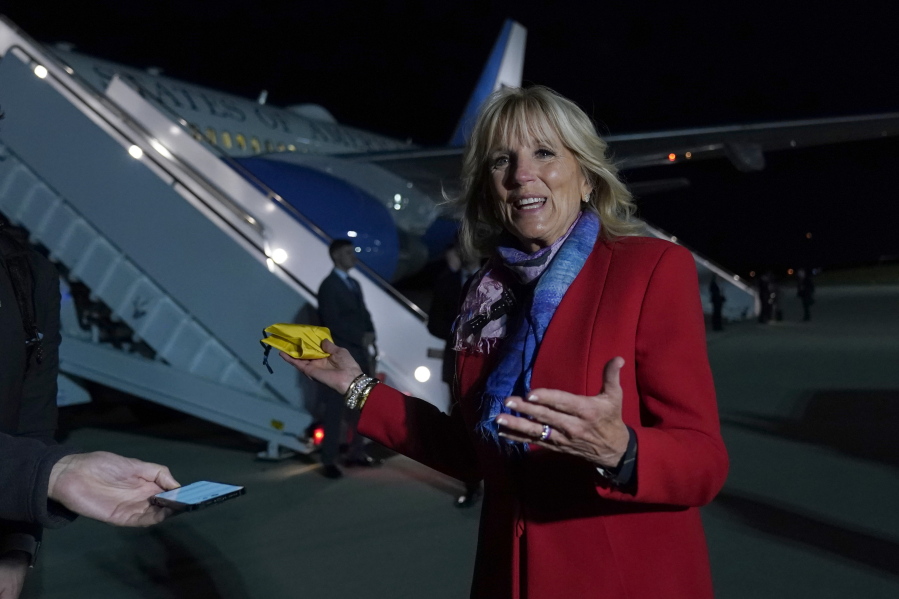 First lady Jill Biden talks to reporters before boarding a plane at Andrews Air Force Base, Md., Thursday, May 5, 2022, as she heads to Romania and Slovakia.