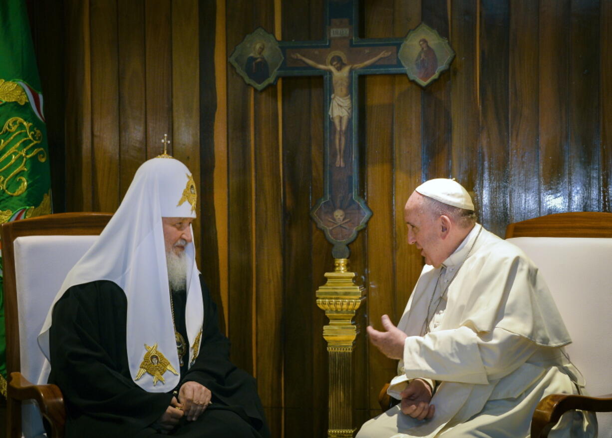 FILE -- In this Friday, Feb. 12, 2016 file photo, the head of the Russian Orthodox Church Patriarch Kirill, left, and Pope Francis talk during their meeting at the Jose Marti airport in Havana, Cuba. Pope Francis hasn't made much of a diplomatic mark in Russia's war in Ukraine as his appeals for an Orthodox Easter truce went unheeded and a planned meeting with the head of the Russian Orthodox Church was canceled.