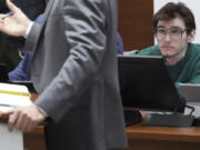 Marjory Stoneman Douglas High School shooter Nikolas Cruz looks up as one of his lawyers, capital defense attorney Casey Secor, makes an argument in court during jury selection in the penalty phase of his trial at the Broward County Courthouse in Fort Lauderdale on Monday, May 16, 2022. Cruz previously pleaded guilty to all 17 counts of premeditated murder and 17 counts of attempted murder in the 2018 shootings.