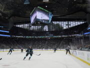 The Seattle Kraken and the San Jose Sharks play during the first period of an NHL hockey game Friday, April 29, 2022, at Climate Pledge Arena in Seattle. (AP Photo/Ted S.