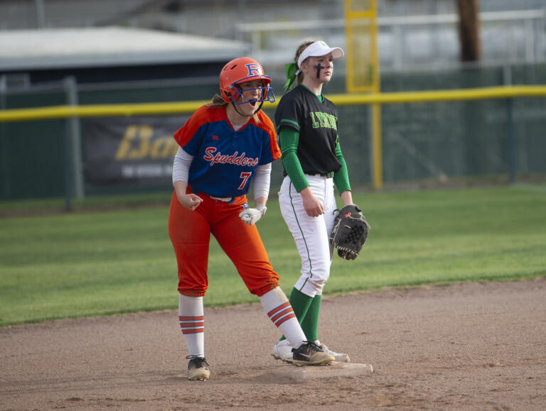 Ridgefield's Alissa Wallway (7) celebrates her double during the Spudders' 7-6 loss to Lynden in the 2A state softball tournament in Selah on Friday, May 27, 2022.