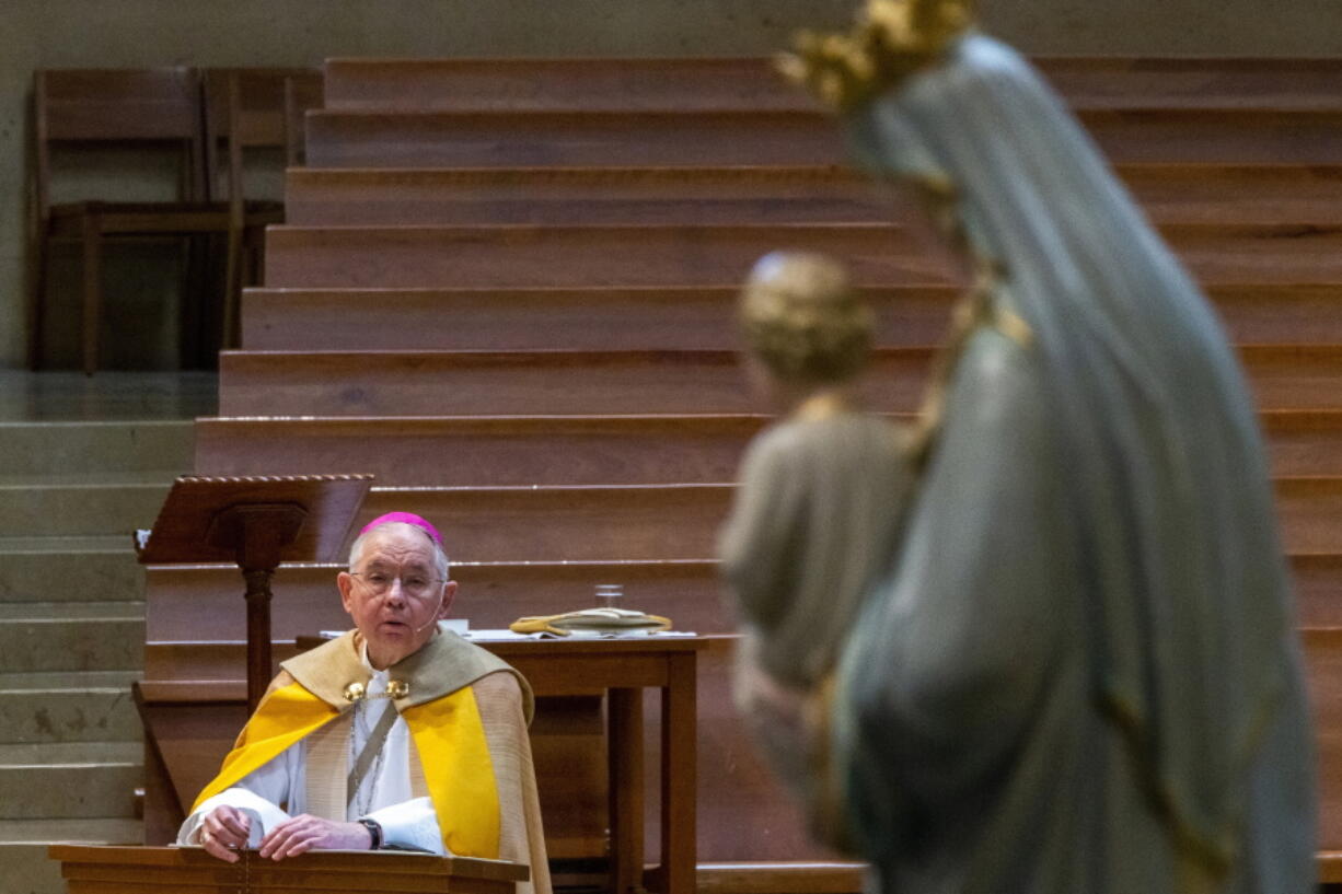 FILE - Archbishop Jose H. Gomez of the Archdiocese of Los Angeles, leads a live-steam service at an empty Cathedral of Our Lady of the Angels in Los Angeles on May 1, 2020. In the wake of the Supreme Court leak on abortion rights, a call for a day of fasting and prayer came from Gomez, the president of the U.S. bishops conference, and Archbishop William Lori of Baltimore, chairman of the USCCB's Committee on Pro-Life Activities.