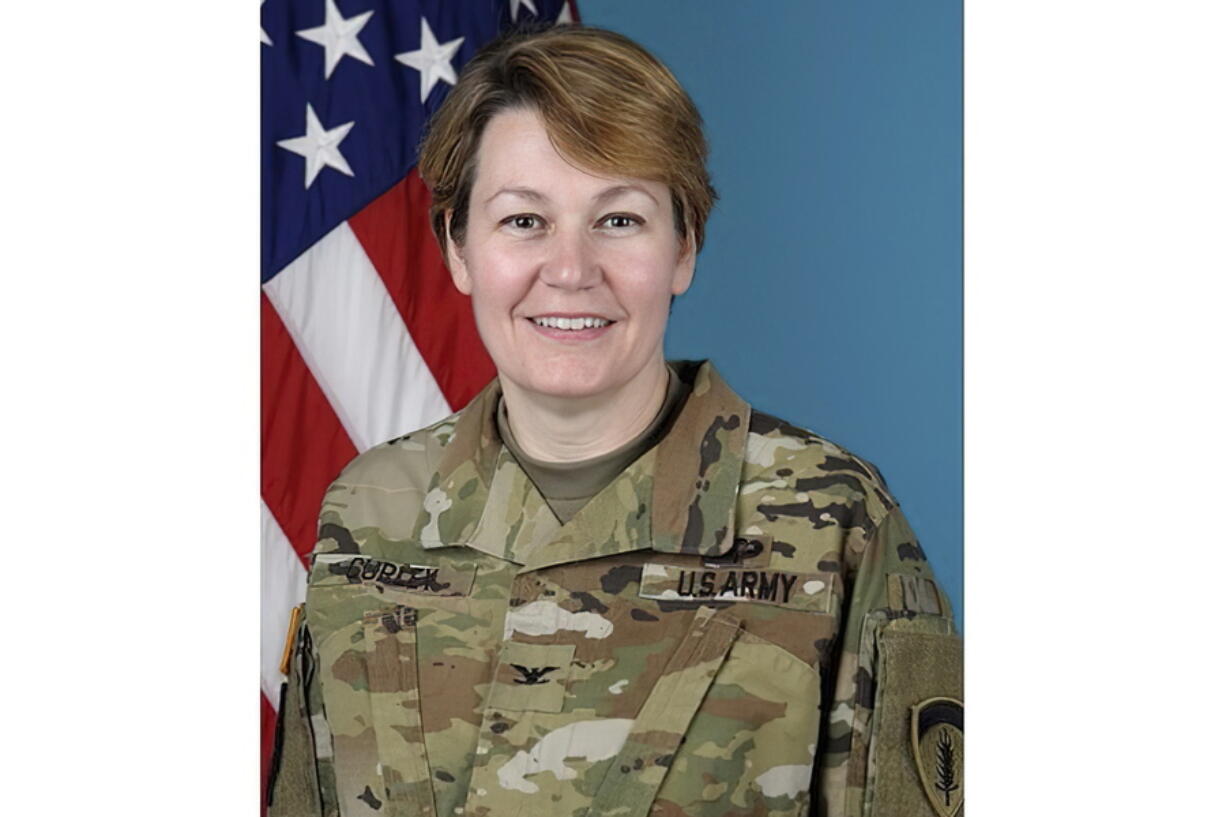 This image provided by the U.S. Army shows Col. Gail Curley.  When Gail Curley began her job as Marshal of the U.S. Supreme Court less than a year ago, she would have expected to work mostly behind the scenes: overseeing the court's police force and the operations of the marble-columned building where the justices work. Earlier this month, however, Curley was handed a bombshell of an assignment, overseeing an investigation into the leak of a draft opinion and apparent votes in a major abortion case. People who know Curley described the former Army colonel, a military lawyer by training, as the right kind of person to be tasked with investigating a highly-charged leak: smart and unlikely to be intimidated but also apolitical and private.  (U.S.