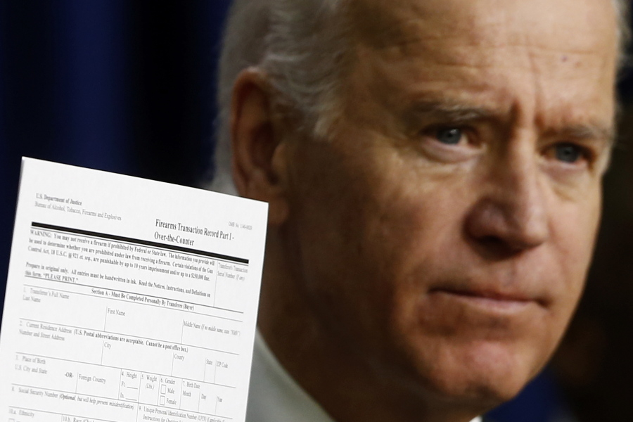 FILE - Vice President Joe Biden holds up a form for over-the-counter firearms purchases as he talks about gun legislation at the Eisenhower Executive Office Building at the White House in Washington, April 9, 2013.