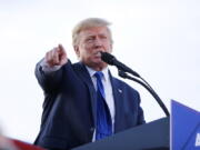 FILE - Former President Donald Trump speaks at a rally at the Delaware County Fairgrounds, Saturday, April 23, 2022, in Delaware, Ohio, to endorse Republican candidates ahead of the Ohio primary. Trump's legal team wants to void a contempt ruling and $10,000-per-day fine against the former president over a subpoena for documents related to a New York civil investigation into his business dealings, saying they've conducted a detailed search for the relevant files.