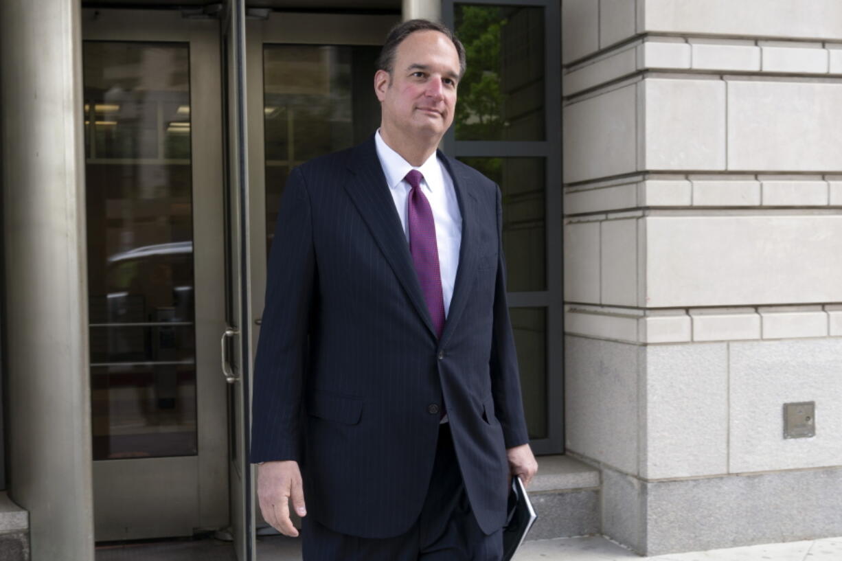FILE - Attorney Michael Sussmann leaves federal court in Washington, April 27, 2022. A federal trial begins May 16 for Sussmann, lawyer for the Hillary Clinton presidential campaign, who is accused of lying to the FBI as it investigated potential ties between Donald Trump and Russia in 2016. The case against Sussmann, a cybersecurity attorney, is the first trial arising from the three-year-old investigation by special counsel John Durham and will test the strength of evidence he's gathered as he's scrutinized the origins of the Trump-Russia probe.