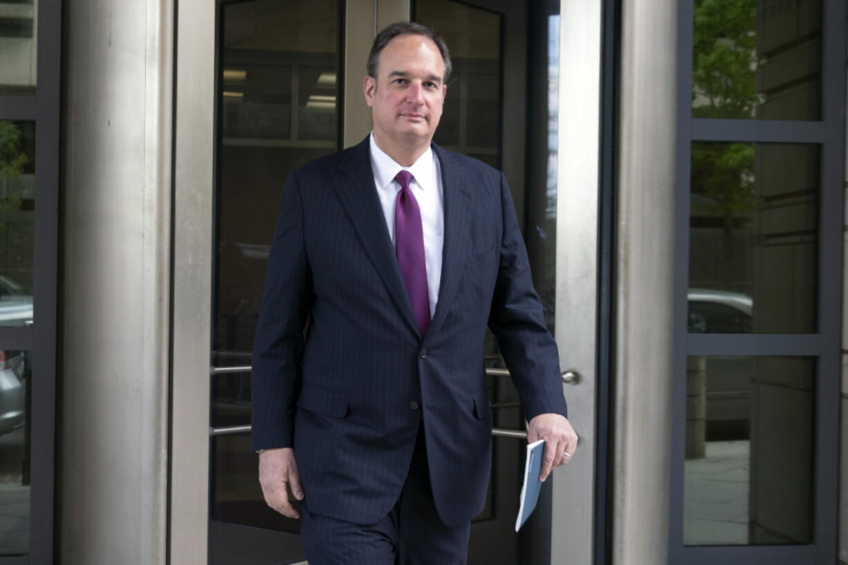 FILE - Attorney Michael Sussmann leaves federal court in Washington, April 27, 2022. A criminal case brought by special counsel John Durham, the prosecutor appointed to investigate potential government wrongdoing in the early days of the Trump-Russia probe, heads to trial in Washington's federal court on May 16. The case centers on a single false statement that Sussmann, a cybersecurity lawyer who represented the Hillary Clinton presidential campaign in 2016, is alleged to have made to the FBI during a meeting that year.