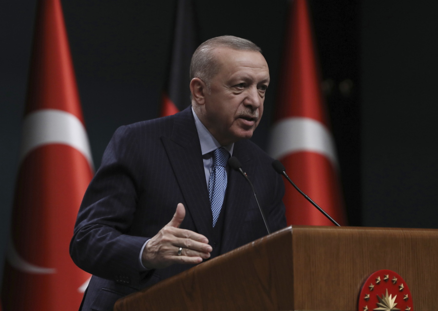 FILE - Turkey's President Recep Tayyip Erdogan speaks during a news conference, in Ankara, Turkey on May 14, 2022. Within a two-week span, Turkey's president has caused a stir by throwing a wrench in Sweden and Finland's historic bid to join the NATO alliance, lashed out at NATO-ally Greece and announced plans for a new incursion into Syria.