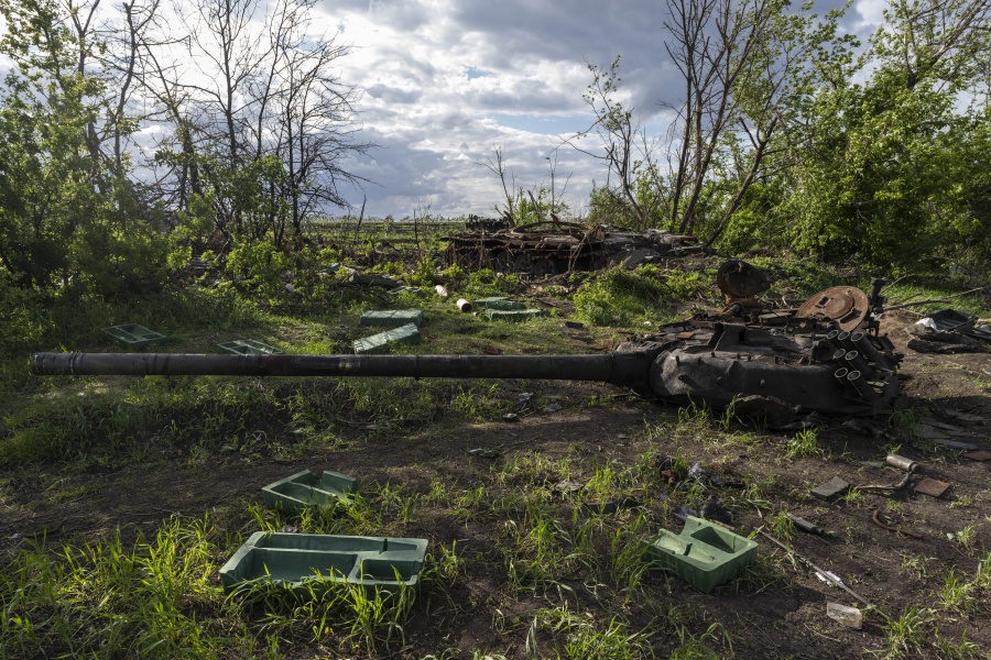 FILE - A destroyed tank near the village of Malaya Rohan, Kharkiv region, Ukraine, Monday, May 16, 2022. Twitter is stepping up its fight against misinformation with a new policy cracking down on posts that spread potentially dangerous false stories. Under the new rules, which take effect Thursday, May 19, 2022, Twitter will no longer automatically recommend posts that mischaracterize conditions during a conflict or make misleading claims about war crimes or atrocities.
