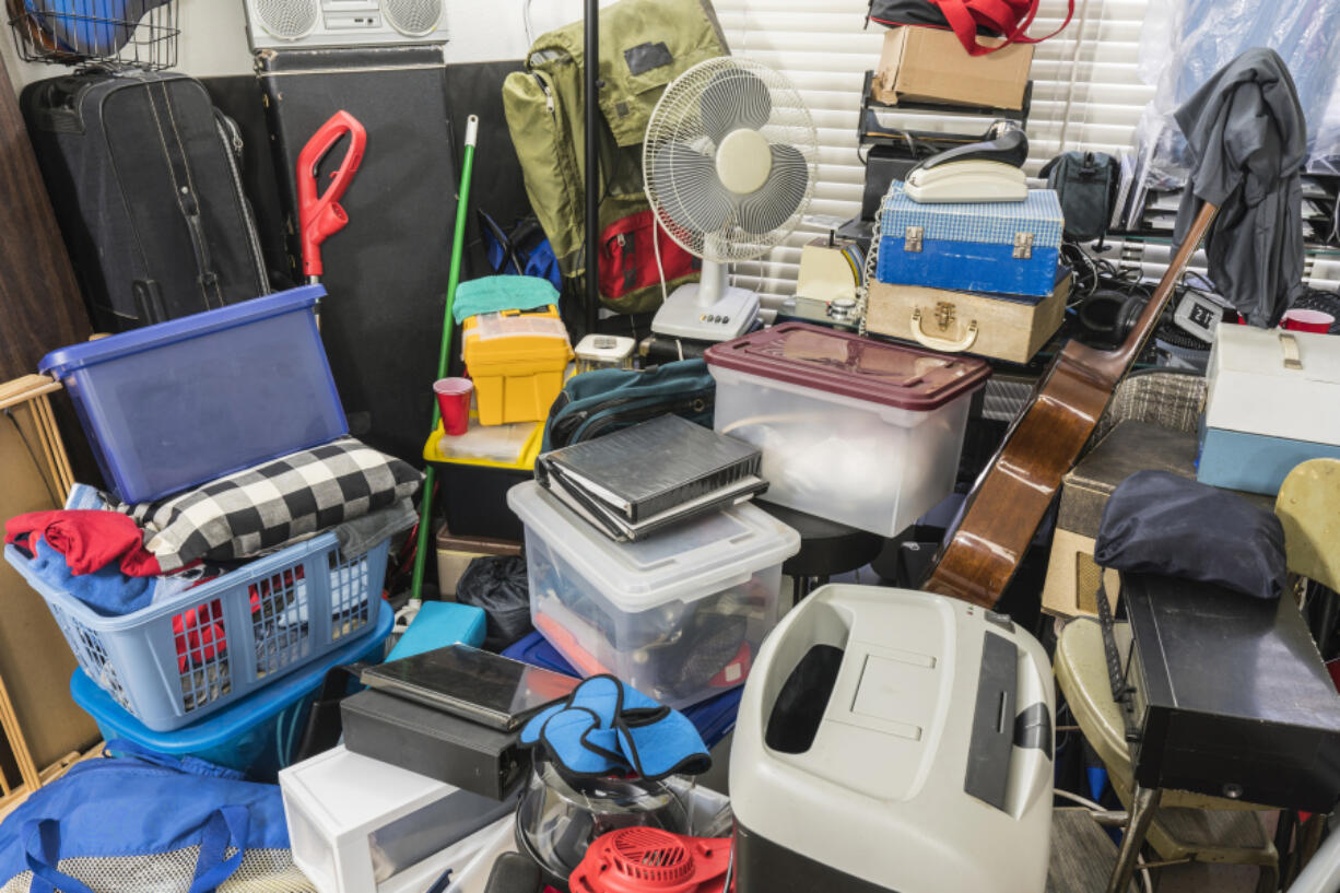 If you're trying to help an aging parent declutter to stay put or in preparation for downsizing, you might say something like, "Let's organize the house so it's a more enjoyable place for family gatherings." (Dreamstime)