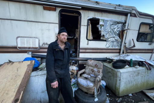 Paul Hunter has taken to sleeping on the roof of his RV, parked along a stretch of NE 33rd Drive in Portland, Oregon. The interior is infested with rats, he says, as well as two rattlesnakes.