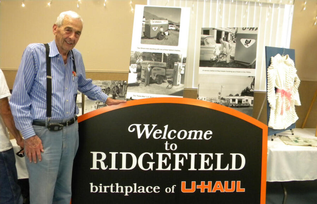 At left, William "Hap" Carty, who was part of the birth of U-Haul in Ridgefield, with the new sign marking that startup, in a 2015 visit to Ridgefield.