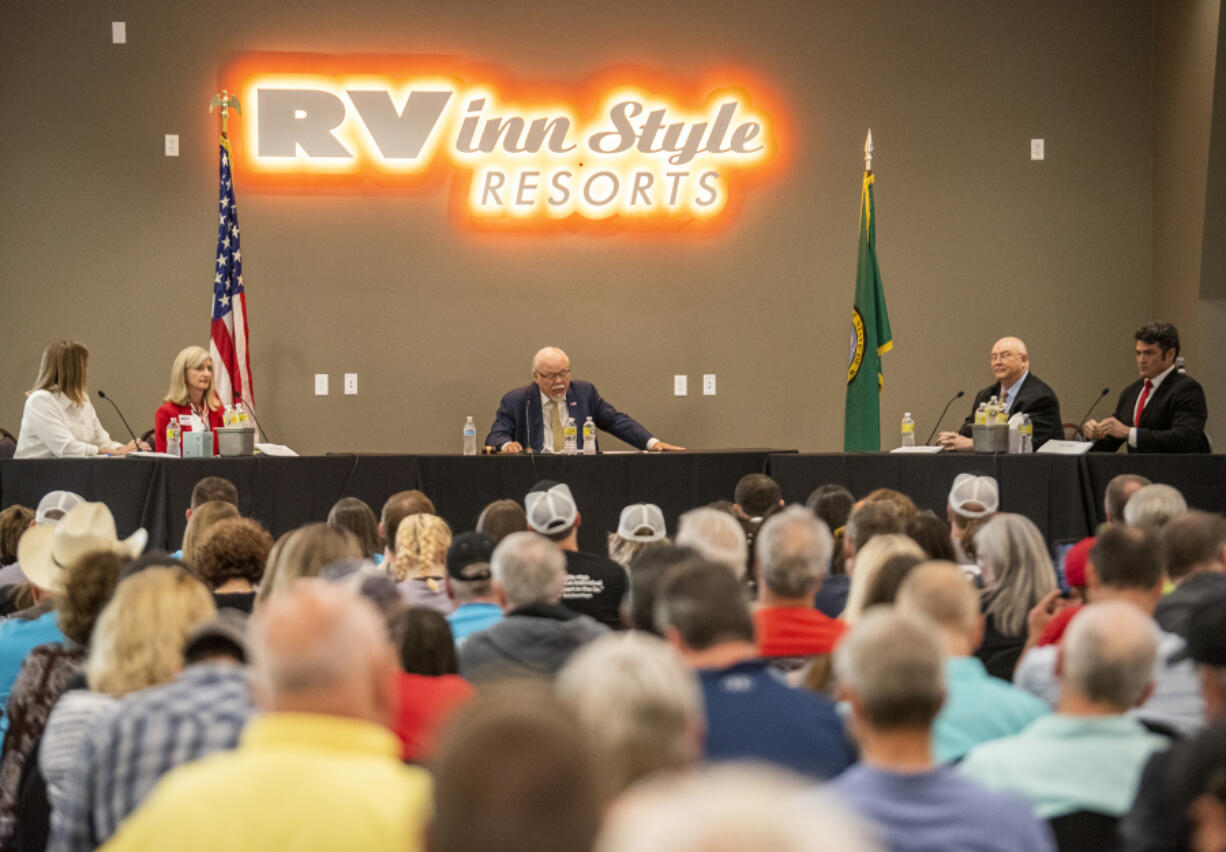 Former state senator Don Benton moderated a debate among Republican candidates for Washington's 3rd Congressional District Tuesday at Vancouver's RV Inn Style Resorts.