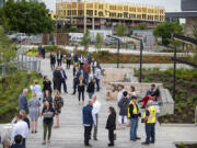 Visitors gather at the new Vancouver Landing for a ribbon cutting ceremony on Thursday. Prior to the renovation, the space had a concrete amphitheater and was seldomly visited. Now, it features a boardwalk, interpretive historical signs and sitting areas.