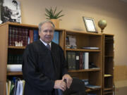 Clark County Superior Court Judge Scott Collier in his office at the Clark County Juvenile Justice Center on June 10. After more than 20 years on the bench, nearly 14 as a judge, Collier will retire Thursday. He plans to spend four months of the year traveling around the world.