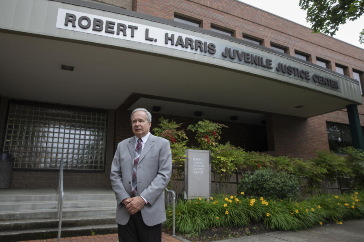 Clark County Superior Court Judge Scott Collier stands outside the Clark County Juvenile Justice Center on June 10. After more than 20 years on the bench, nearly 14 as a judge, Collier will retire Thursday.