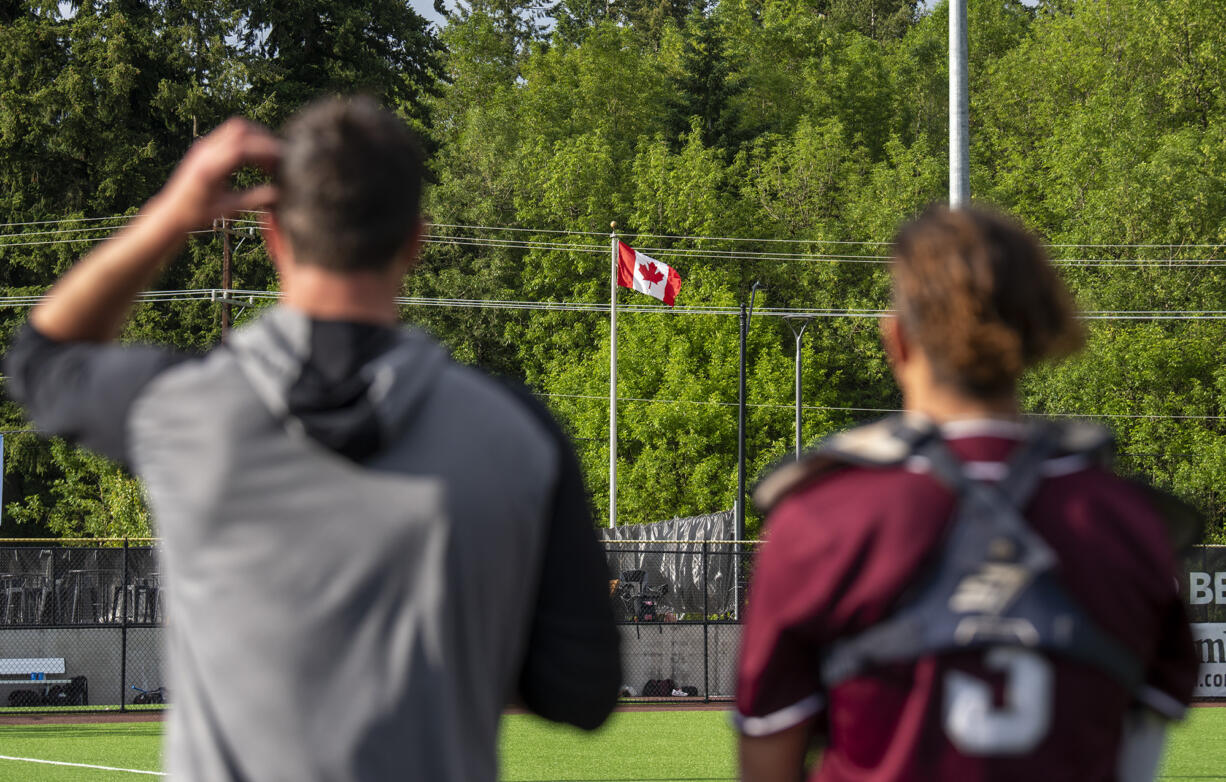 The Canadian flag waves during the Canadian national anthem Tuesday, June 14, 2022, during a Raptors game against the Edmonton Riverhawks at the Ridgefield Outdoor Recreation Complex.