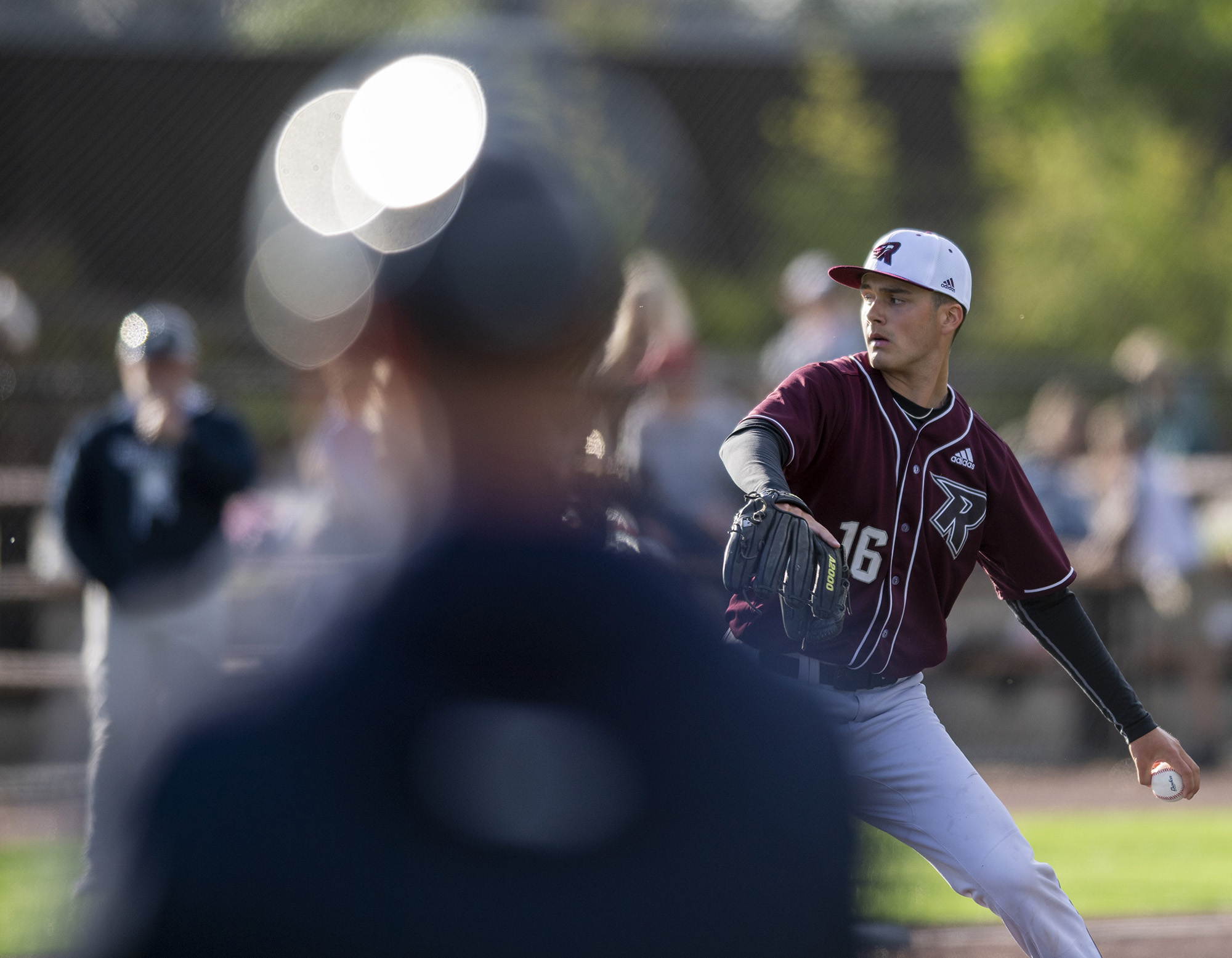 Raptors pitcher Brayden Marcum, right, throws the ball Tuesday, June 14, 2022, during a Raptors game against the Edmonton Riverhawks at the Ridgefield Outdoor Recreation Complex.