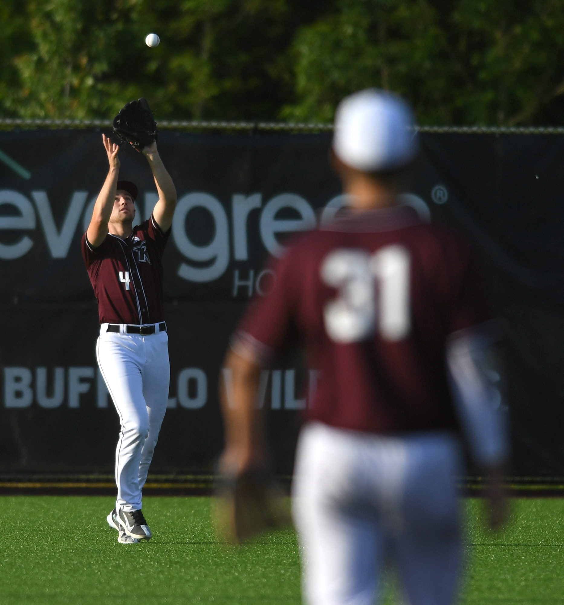 Raptors outfielder Doyle Kane catches a fly ball Tuesday, June 14, 2022, during a Raptors game against the Edmonton Riverhawks at the Ridgefield Outdoor Recreation Complex.