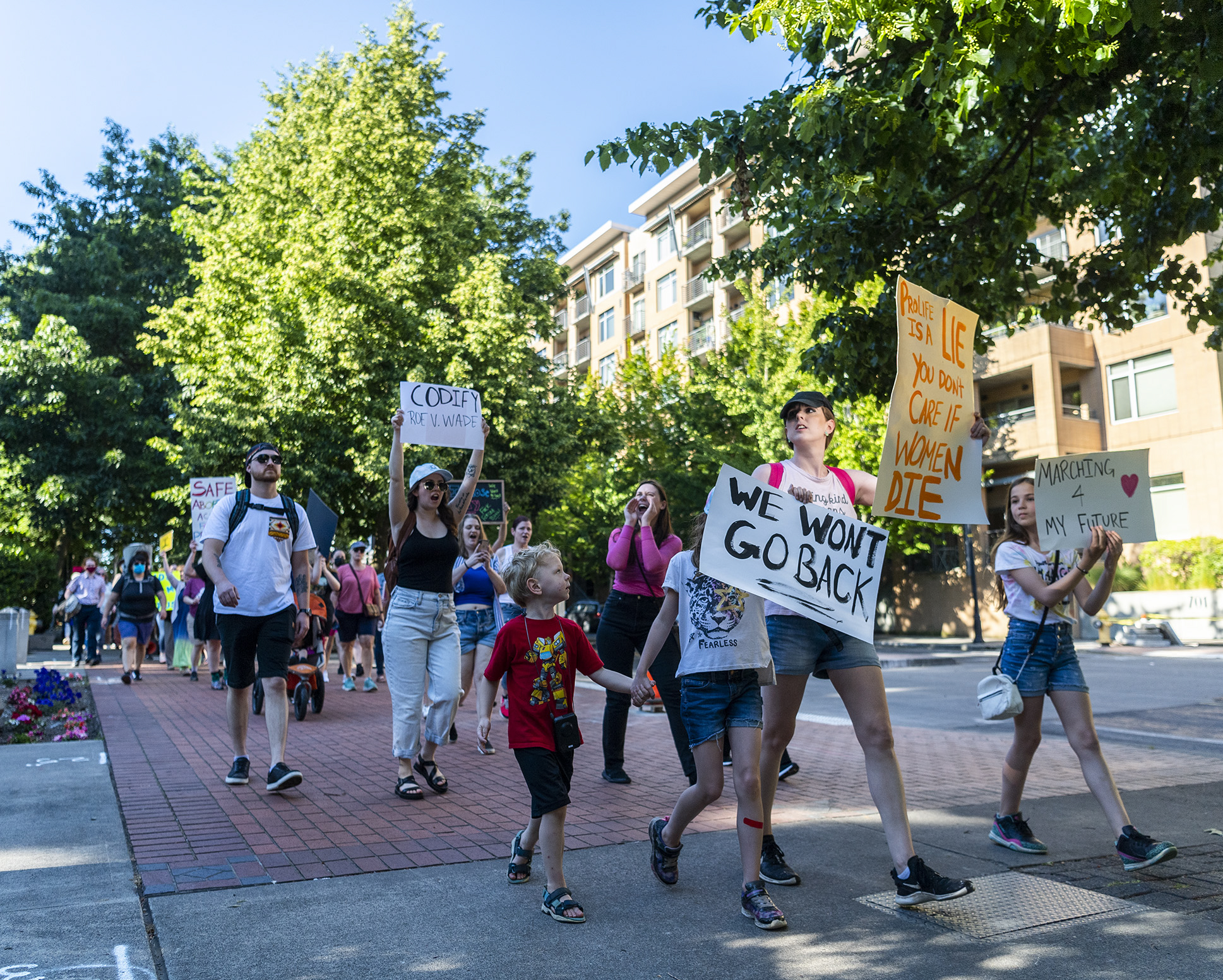 Protestors march around Esther Short Park on Friday, June 24, 2022, during a rally and march in response to the Supreme Court's decision to overturn the landmark Roe v. Wade that protected abortion access nationwide.