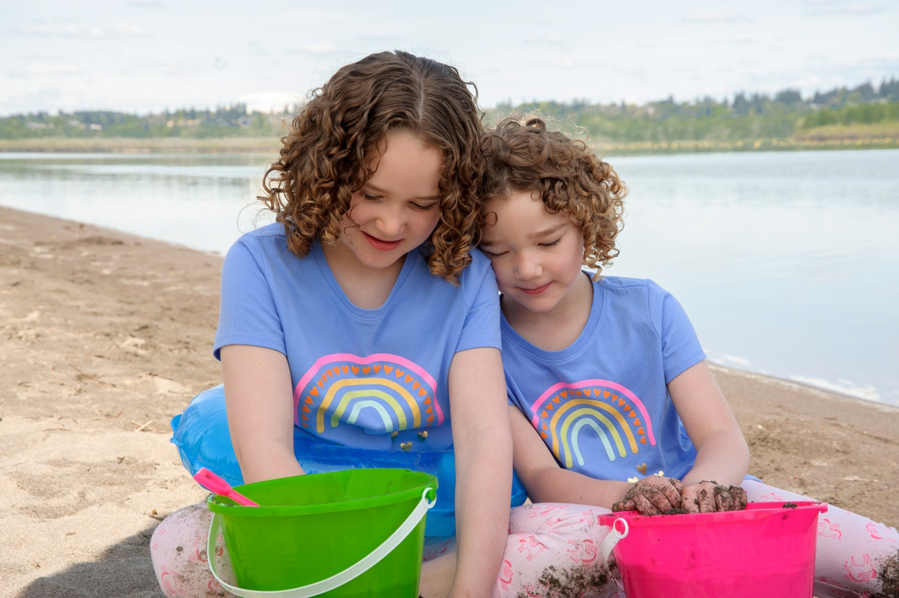 Bailey Wilkes, left, and her younger sister Sammy play in the sand at Vancouver Lake. At 6 months old, Bailey was diagnosed with severe allergies to more then 20 different kinds of food, including eggs and most kinds of nuts. Now, thanks to a unique program at the Southern California Food Allergy Institute and a grant provided by United Healthcare Children's Foundation, Bailey is on her way to overcoming many of her allergies.