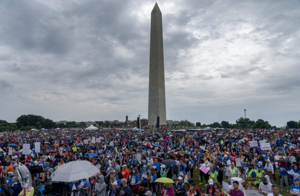 People participate in the second March for Our Lives rally in support of gun control in front of the Washington Monument, Saturday, June 11, 2022, in Washington. The rally is a successor to the 2018 march organized by student protestors after the mass shooting at a high school in Parkland, Fla.