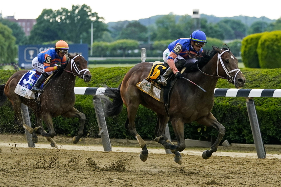 Mo Donegal (6), with jockey Irad Ortiz Jr., pulls away from Nest (3), with Jose Ortiz, before crossing the finish line to win the 154th running of the Belmont Stakes horse race, Saturday, June 11, 2022, at Belmont Park in Elmont, N.Y.