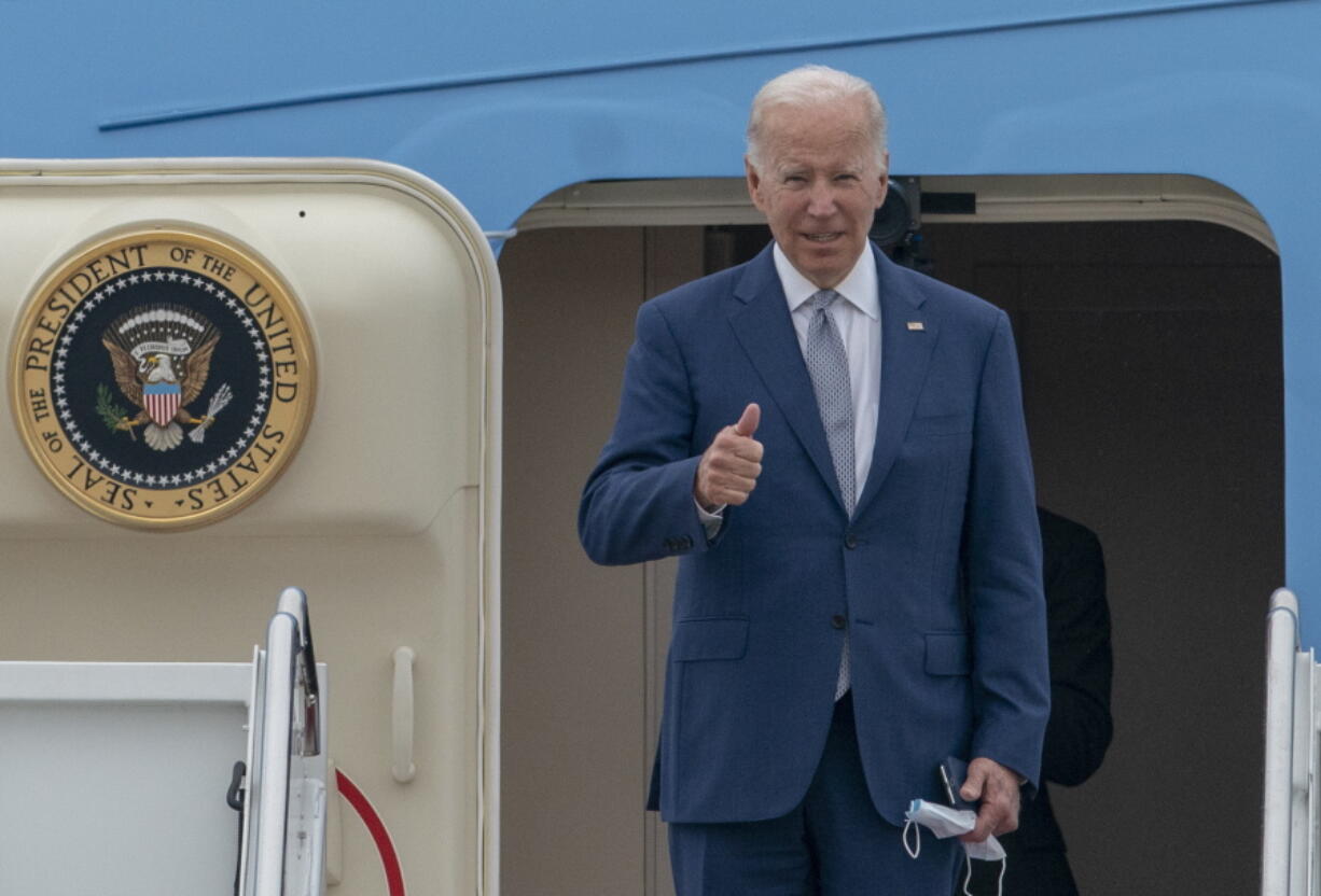 President Joe Biden gestures as he boards Air Force One at Andrews Air Force Base, Md., Tuesday, June 14, 2022. Biden is traveling to Philadelphia to speak at the AFL-CIO convention on how he's trying to make the economy work for working-class Americans.