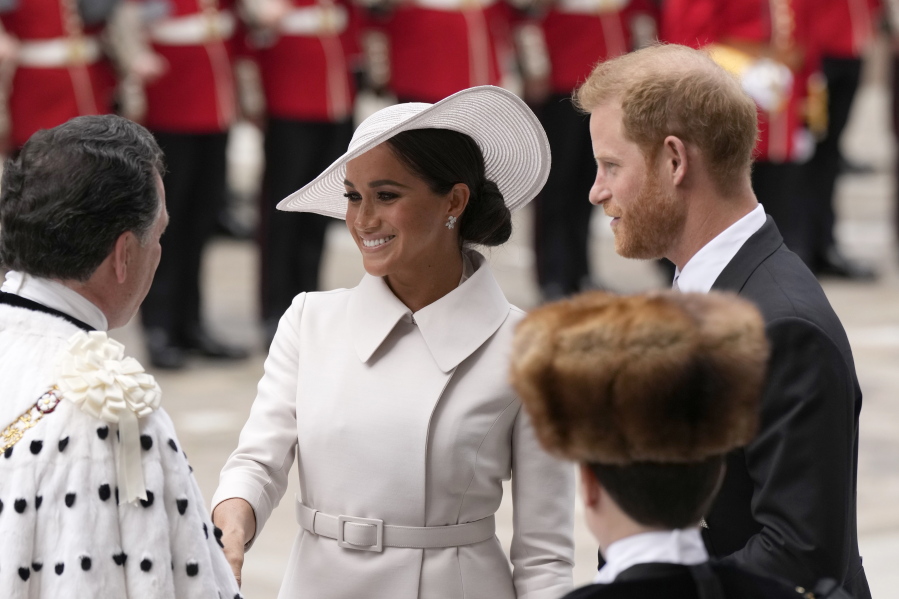 Prince Harry and Meghan Markle, Duke and Duchess of Sussex arrive for a service of thanksgiving for the reign of Queen Elizabeth II at St Paul's Cathedral in London, Friday, June 3, 2022 on the second of four days of celebrations to mark the Platinum Jubilee. The events over a long holiday weekend in the U.K. are meant to celebrate the monarch's 70 years of service.