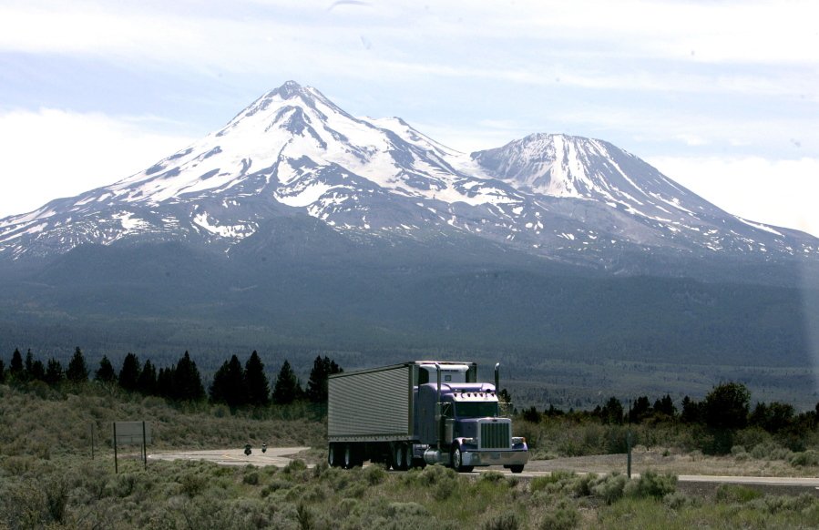 FILE -- This June 19, 2008 file photo shows Mount Shasta near Weed, Calif. Authorities say a mountain climbing guide has died and at least four other people have been injured while trying to summit California's Mount Shasta in treacherous conditions, Monday, June 6, 2022.