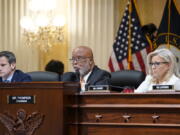 Chairman Bennie Thompson, D-Miss., center, speaks as the House select committee investigating the Jan. 6 attack on the U.S. Capitol continues to reveal its findings of a year-long investigation, at the Capitol in Washington, Thursday, June 23, 2022. Rep. Adam Kinzinger, R-Ill., left, and Vice Chair Liz Cheney, R-Wyo., right, listen. (AP Photo/J.
