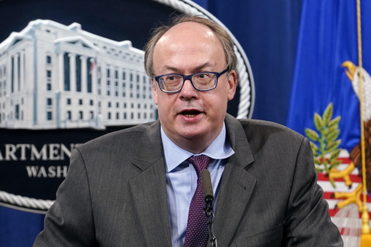 FILE - Jeffrey Clark, then-Assistant Attorney General for the Environment and Natural Resources Division, speaks during a news conference at the Justice Department in Washington, on Sept. 14, 2020. Federal agents have searched the Virginia home of the Trump-era Justice Department official who championed efforts by President Donald Trump to overturn the results of the 2020 election.