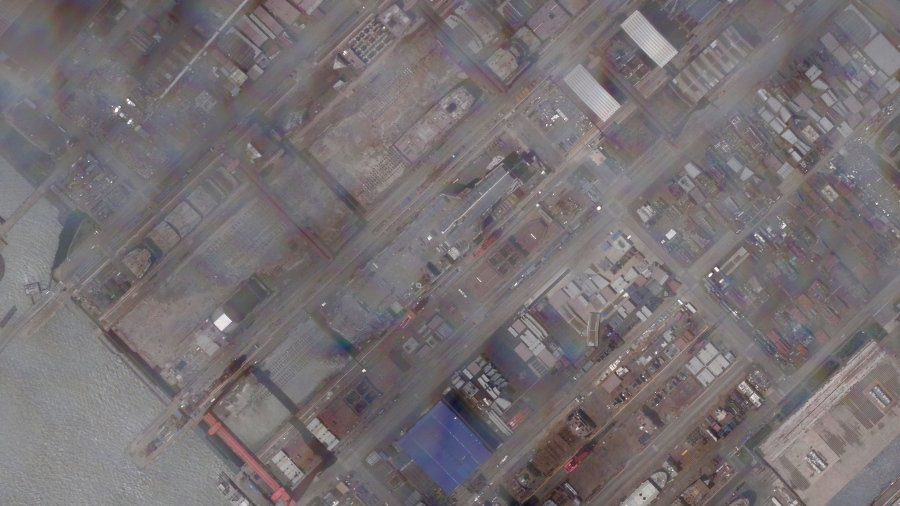 This satellite image provided by Planet Labs PBC shows construction of China's Type 003 aircraft carrier at the Jiangnan Shipyard northeast of Shanghai, China, Tuesday, May 31, 2022.  China's most advanced aircraft carrier to date appears to be nearing completion, satellite photos analyzed by The Associated Press showed Friday, June 3, as experts suggested the vessel could be launched soon.