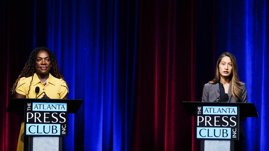 FILE - Former state Rep. Dee Dawkins-Haigler, left, and Georgia State Rep. Bee Nguyen, right, participate in Georgia's secretary of state democratic primary election runoff debates, June 6, 2022, in Atlanta.