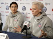 United States women's national soccer team members Alex Morgan, left, and Megan Rapinoe were joined by some of the country's leading sports figures in publicly sharing their dismay, anger and concern after the Supreme Court overturned Roe v. Wade.