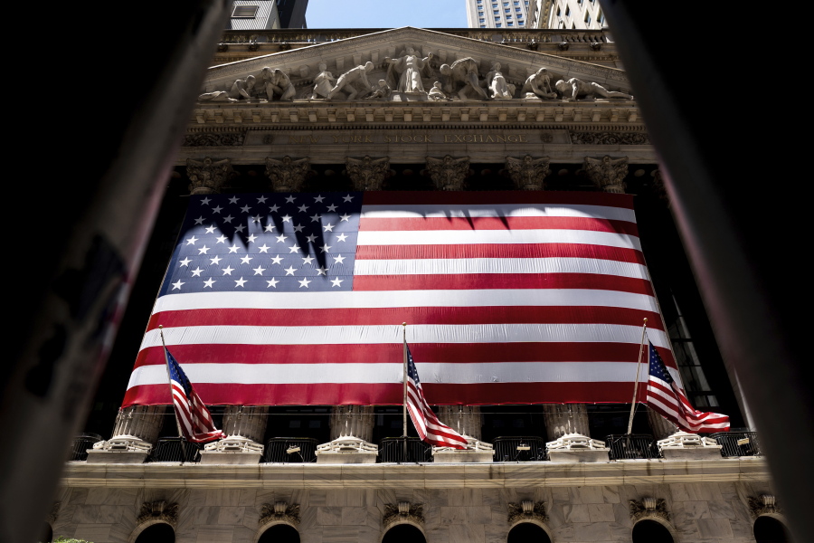 The American flag is shown at the New York Stock Exchange on Wednesday, June 29, 2022 in New York.  Stocks shifted between gains and losses on Wall Street Wednesday, keeping the market on track for its fourth monthly loss this year.