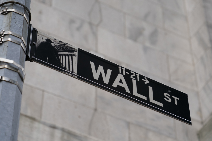 FILE - A Wall Street sign is shown in the Financial District, on Oct. 13, 2021, in the Manhattan borough of New York. Stocks are opening lower on Wall Street on Friday, June 3, 2022, putting indexes back into the red for the week.