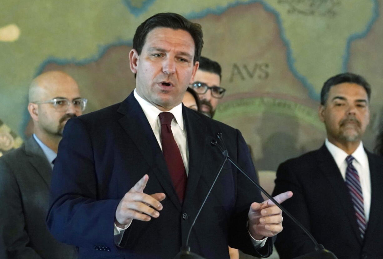 FILE - Florida Gov. Ron DeSantis speaks at Miami's Freedom Tower, on Monday, May 9, 2022. Florida Gov. Ron DeSantis on Thursday, May 26, 2022 signed into a law sweeping property insurance legislation that creates a $2 billion reinsurance fund and rewrites rules on coverage denials and attorney fees, in a move to stabilize rising costs and insurer losses.