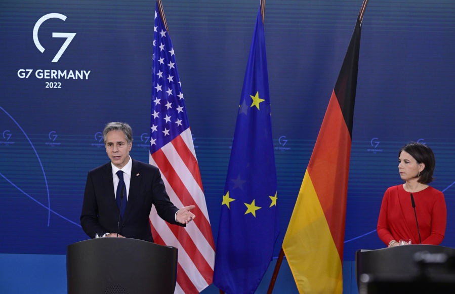 US Secretary of State Antony Blinken, left, and German Foreign Minister Annalena Baerbock, right, address the media during a joint press conference after a meeting in Berlin, Germany, Friday, June 24, 2022.
