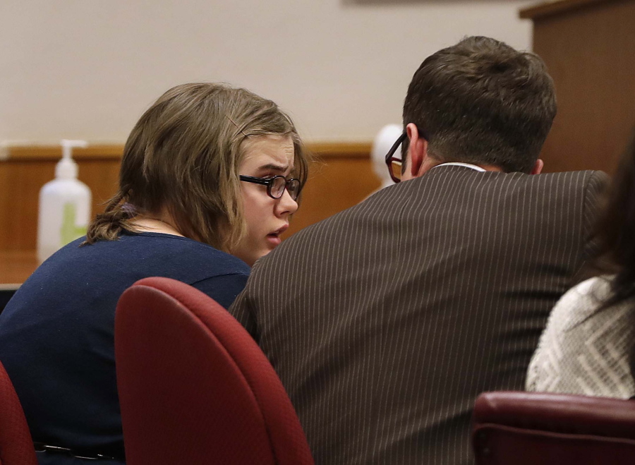 Morgan Geyser speaks with attorney Anthony Cotton, Feb. 1, 2018. Geyser, 20, is asking a judge in Waukesha County to order her release as he did last year for her co-defendant, Anissa Weier. A hearing is scheduled Thursday, June 23, 2022. Geyser and Weier, also 20, pleaded guilty, but not guilty due to mental disease to attempted homicide after luring Payton Leutner into a Waukesha park following a sleepover in May 2014. Geyser repeatedly stabbed Leutner while Weier urged her on. All three girls were 12 at the time.