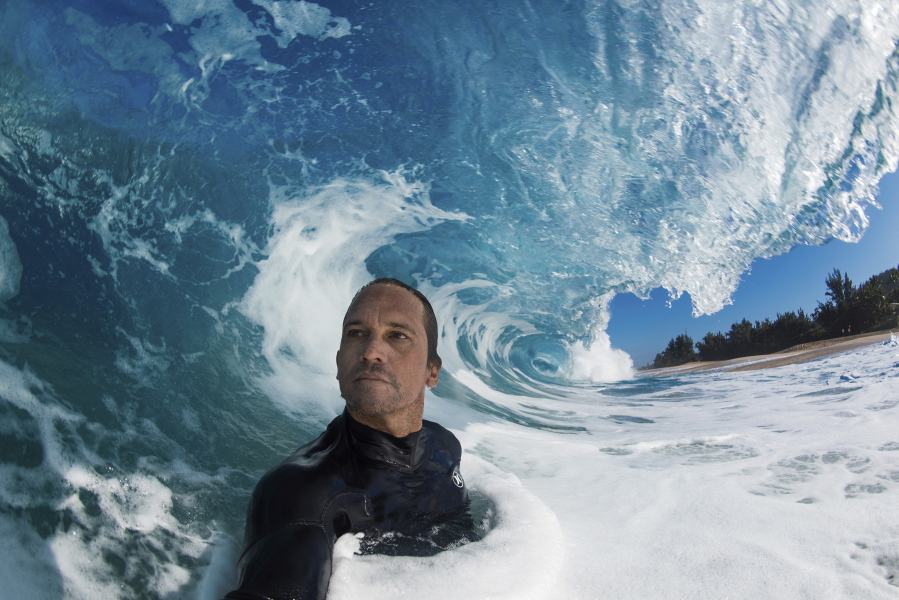 Clark Little takes a selfie as he photographs waves on the North Shore of Oahu near Haleiwa, Hawaii.