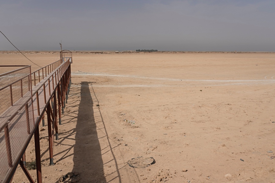 A general view of the dried up Lake Sawa Iraq, is seen Saturday, June 4, 2022. This year, for the first time in its centuries-long history, Sawa Lake dried up completely. A combination of mismanagement by local investors, government neglect and climate change has ground down its azure shores to chunks of salt.